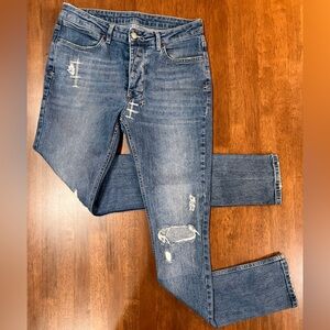 KSUBI MENS R/N 150730 SKINNY JEANS IN MEDIUM WASH. SIZE 32”